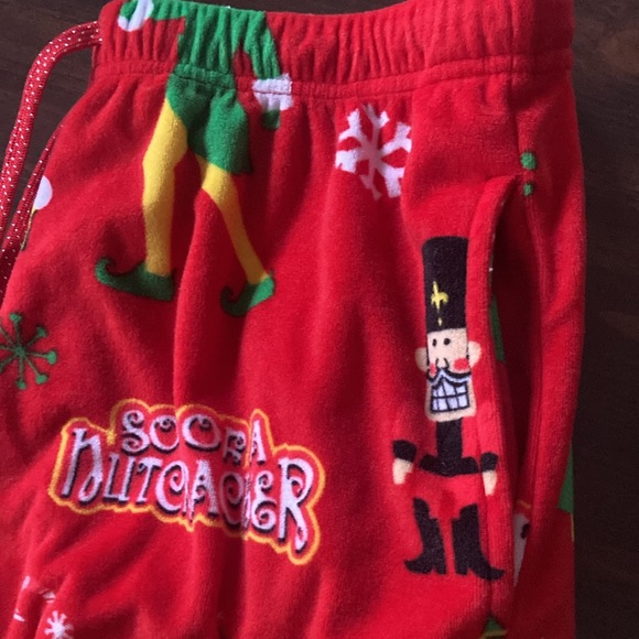 FINAL DROP 🚨 NWOT THE ELF MOVIE Son of a nutcracker unisex drawstring pockets - Picture 2 of 3